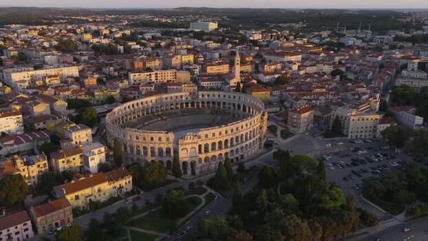 Aerial view of Pula Arena and historic city rooftops Croatia. Aerial view of Pula Arena and historic city rooftops Croatia.