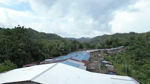Aerial view of Batang Ai longhouse in the rainforest Malaysia. Aerial view of Batang Ai longhouse in the rainforest Malaysia.