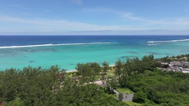 Aerial view of Le Morne peninsula and turquoise waters Mauritius.