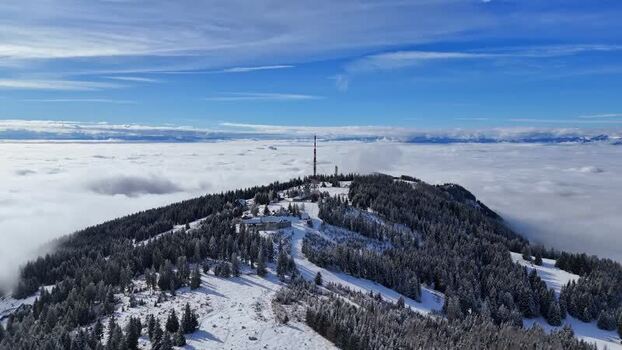 Aerial view of Schockl mountain peak and clouds Austria. Aerial view of Schockl mountain peak and clouds Austria.