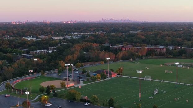 Aerial view of sports fields at dusk United States.