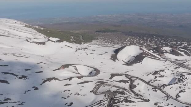 Aerial view of Rifugio Sapienza and volcanic craters on Mount Etna Italy. Aerial view of Rifugio Sapienza and volcanic craters on Mount Etna Italy.