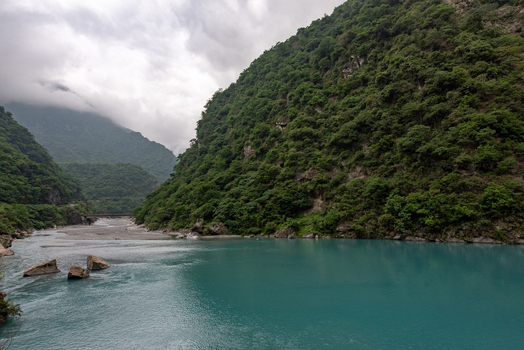 View of the turquoise Liwu River flowing through the lush green mountains and steep cliffs of Taroko National Park Xiulin Township Hualien County Taiwan.