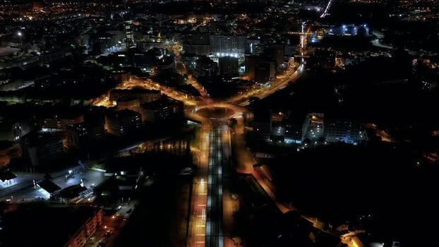 Aerial view of roundabout and city lights Portugal.