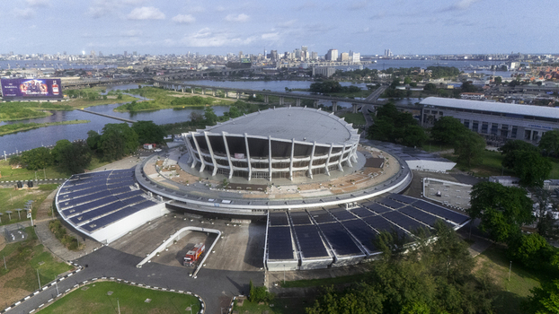 Aerial view of the Wole Soyinka Centre for Culture and Creative Arts and National Theatre Nigeria with its unique architecture and solar panels Lagos Lagos Nigeria. Aerial view of the Wole Soyinka Centre for Culture and Creative Arts and National Theatre Nigeria with its unique architecture and solar panels Lagos Lagos Nigeria.