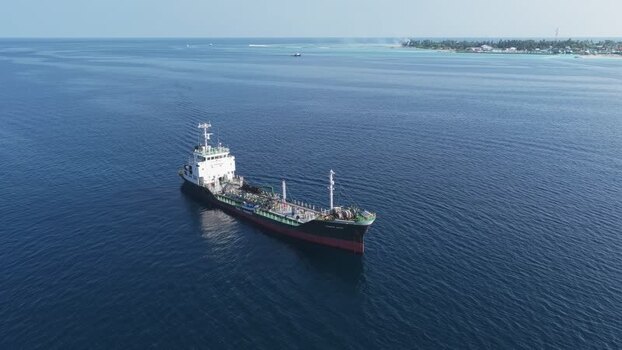 Aerial view of a cargo ship on the ocean Maldives.