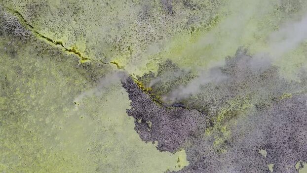 Aerial view of sulfur deposits and steam in the Danakil Desert Ethiopia. Aerial view of sulfur deposits and steam in the Danakil Desert Ethiopia.