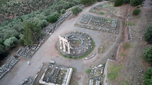 Aerial view of the ancient Tholos of Athena Pronaia in Greece. Aerial view of the ancient Tholos of Athena Pronaia in Greece.