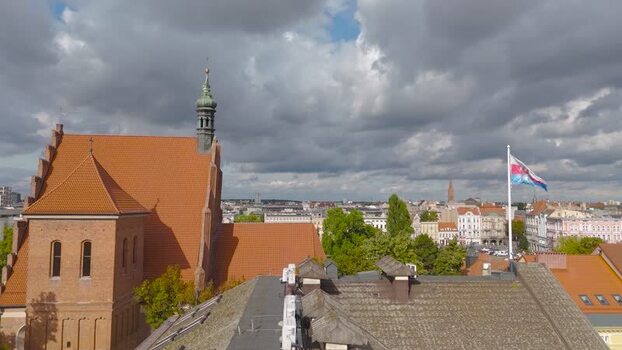 Aerial view of church and flag in Bydgoszcz Poland. Aerial view of church and flag in Bydgoszcz Poland.