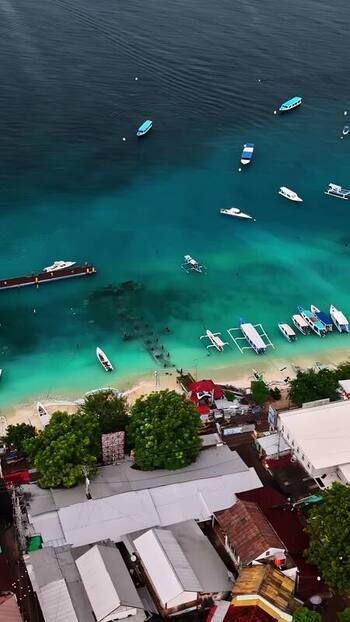 Aerial view of boats at a beach in Bali Indonesia.