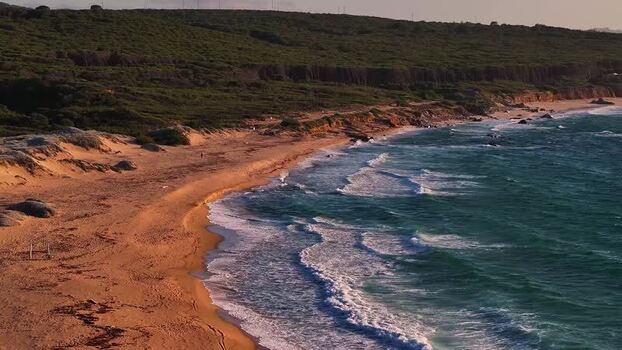 Aerial view of the rugged coastline and sandy beach Italy. Aerial view of the rugged coastline and sandy beach Italy.