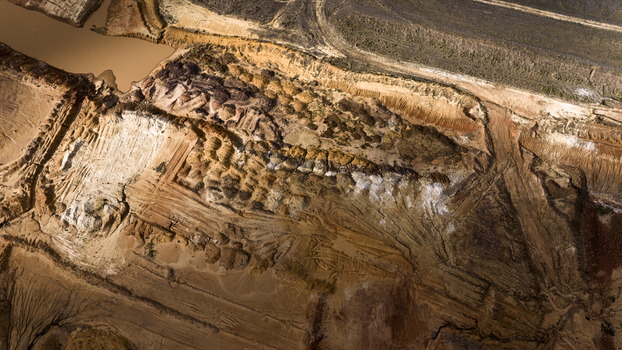 Aerial view of industrial mining patterns showing textured earth sand and salt deposits in a remote landscape in Kalbarri Western Australia Australia. Aerial view of industrial mining patterns showing textured earth sand and salt deposits in a remote landscape in Kalbarri Western Australia Australia.