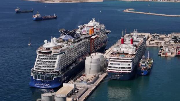 Aerial view of cruise ships docked at the port of Gibraltar. Aerial view of cruise ships docked at the port of Gibraltar.