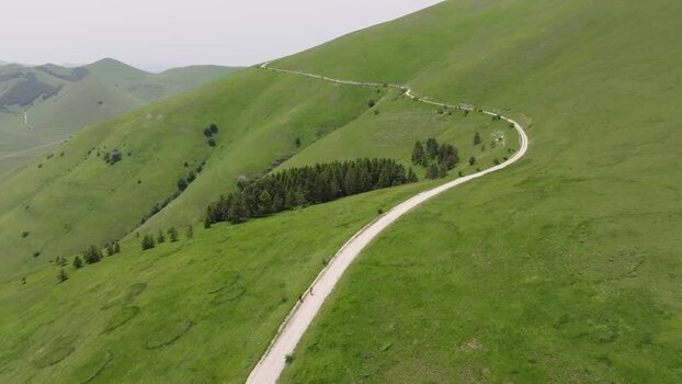 Aerial view of winding road in Castelluccio Italy.