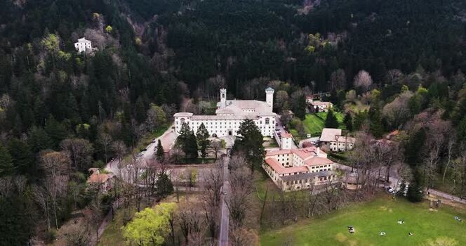 Aerial view of Vallombrosa Abbey surrounded by dense forest Italy. Aerial view of Vallombrosa Abbey surrounded by dense forest Italy.