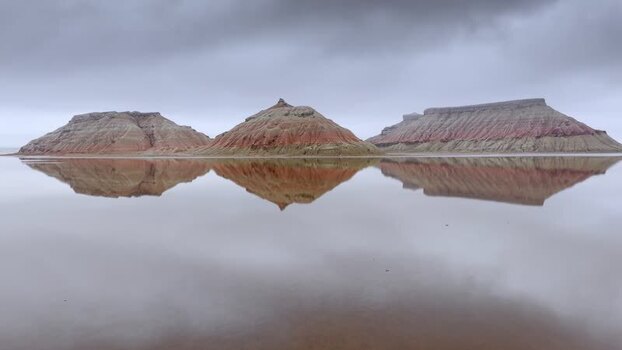 Aerial view of Karynzharyk rock formations reflected in water Kazakhstan. Aerial view of Karynzharyk rock formations reflected in water Kazakhstan.