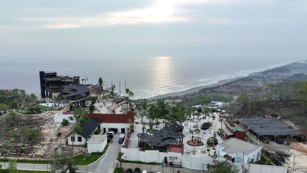 Kecamatan Purwosari Daerah Istimewa Yogya Indonesia 23 November 2023 Aerial view of Obelix Sea View featuring modern architecture outdoor terraces and panoramic Indian Ocean coastline views. Kecamatan Purwosari Daerah Istimewa Yogya Indonesia 23 November 2023 Aerial view of Obelix Sea View featuring modern architecture outdoor terraces and panoramic Indian Ocean coastline views.