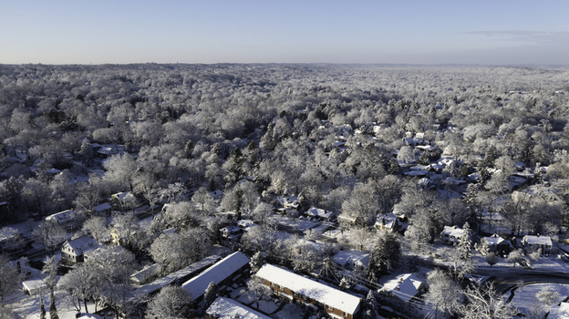 Aerial view of a snow covered residential neighborhood in Summit New Jersey United States. Aerial view of a snow covered residential neighborhood in Summit New Jersey United States.