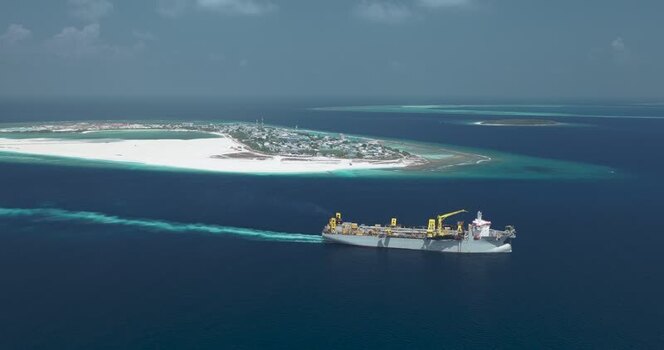 Aerial view of an industrial ship near Dhidhdhoo Maldives. Aerial view of an industrial ship near Dhidhdhoo Maldives.