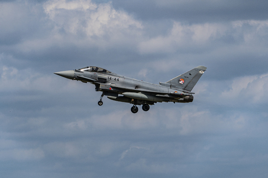 Berlin Germany 13 June 2026 View of a Eurofighter Typhoon fighter jet in flight during the ILA Berlin Air Show with landing gear deployed against a cloudy sky. Berlin Germany 13 June 2026 View of a Eurofighter Typhoon fighter jet in flight during the ILA Berlin Air Show with landing gear deployed against a cloudy sky.