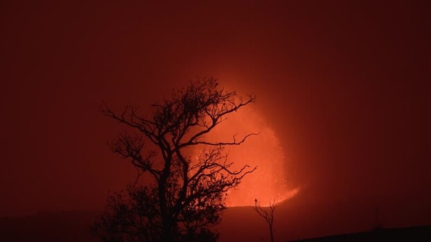 View of Halemaumau Crater lava eruption at night United States.