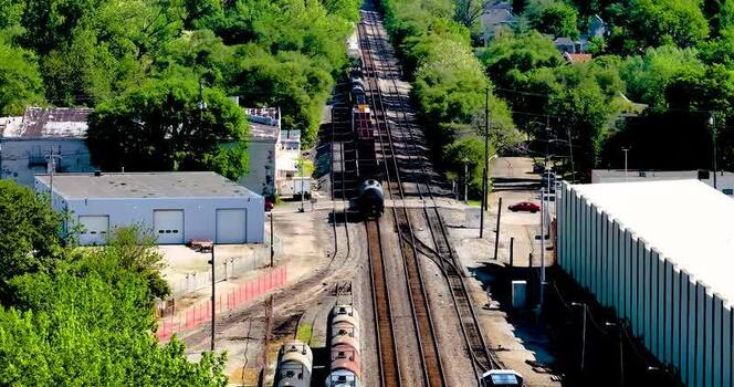 Aerial view of freight trains on tracks United States. Aerial view of freight trains on tracks United States.
