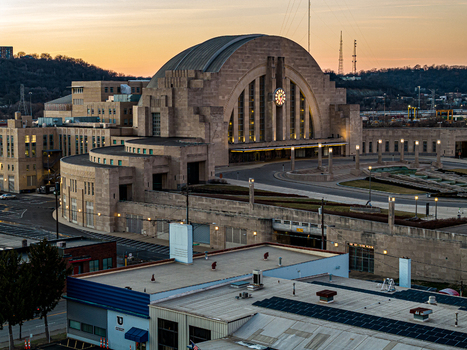 Aerial view of the grand art deco Union Terminal bathed in the soft glow of twilight Cincinnati Ohio United States. Aerial view of the grand art deco Union Terminal bathed in the soft glow of twilight Cincinnati Ohio United States.