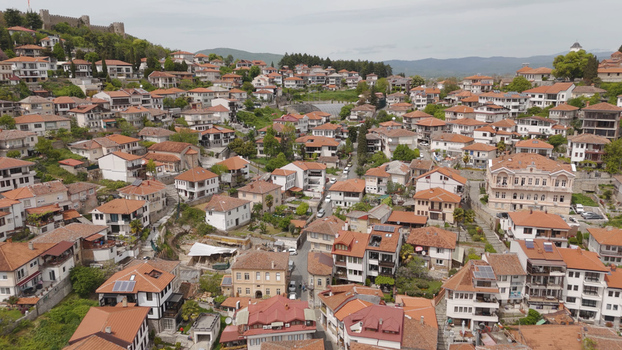Aerial view of the historic old town of Ohrid with traditional terracotta rooftops narrow streets and Samuel s Fortress on the hill in Ohrid Municipality of Ohrid North Macedonia. Aerial view of the historic old town of Ohrid with traditional terracotta rooftops narrow streets and Samuel s Fortress on the hill in Ohrid Municipality of Ohrid North Macedonia.