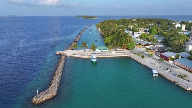 Aerial view of the harbor and coastline of Kendhoo Maldives. Aerial view of the harbor and coastline of Kendhoo Maldives.