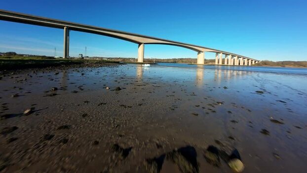 Aerial FPV view of boat under bridge United Kingdom. Aerial FPV view of boat under bridge United Kingdom.