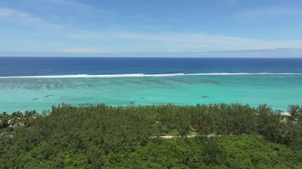 Aerial view of the turquoise lagoon at Le Morne Mauritius.