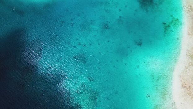 Aerial view of Los Roques archipelago turquoise waters Venezuela.