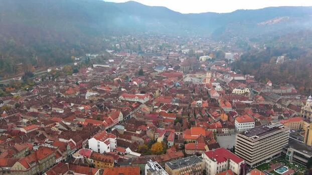 Aerial view of Brasov old town and historic rooftops Romania. Aerial view of Brasov old town and historic rooftops Romania.
