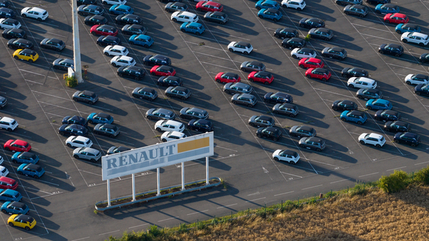 Lambres lez Douai France 07 July 2026 Aerial view of the Renault factory logistics area in Lambres lez Douai featuring rows of new cars parked in a large lot.