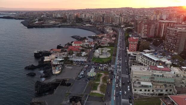 Aerial view of the coastal road and city skyline in Catania Italy. Aerial view of the coastal road and city skyline in Catania Italy.