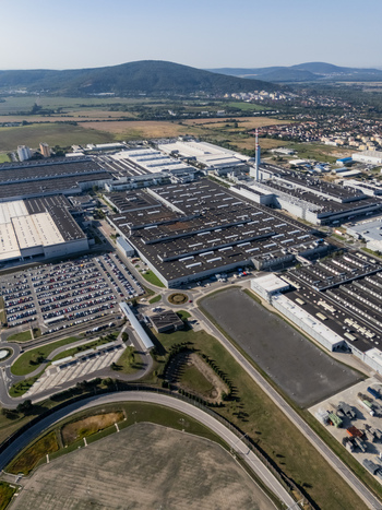 Aerial view of the Volkswagen plant near Devinska Nova Ves with large industrial buildings and parking lots under a clear sky in Bratislava Bratislavsky kraj Slovakia. Aerial view of the Volkswagen plant near Devinska Nova Ves with large industrial buildings and parking lots under a clear sky in Bratislava Bratislavsky kraj Slovakia.