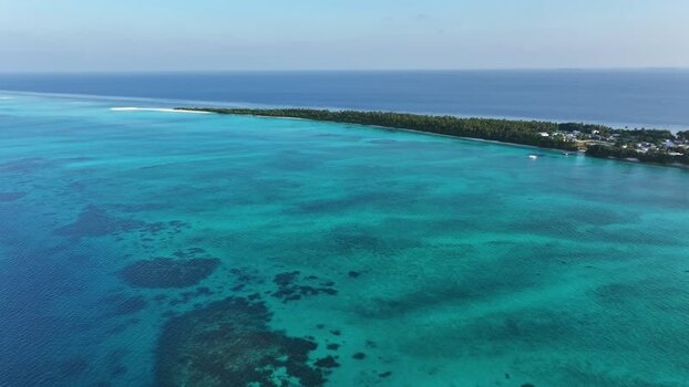Aerial view of tropical island Fulhadhoo with turquoise water Maldives. Aerial view of tropical island Fulhadhoo with turquoise water Maldives.