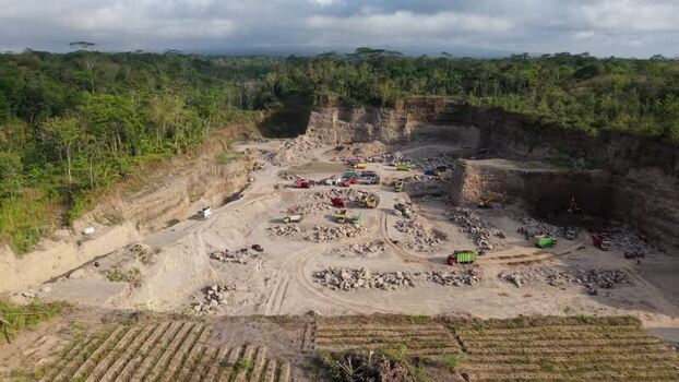 Aerial view of trucks in the quarry Indonesia. Aerial view of trucks in the quarry Indonesia.