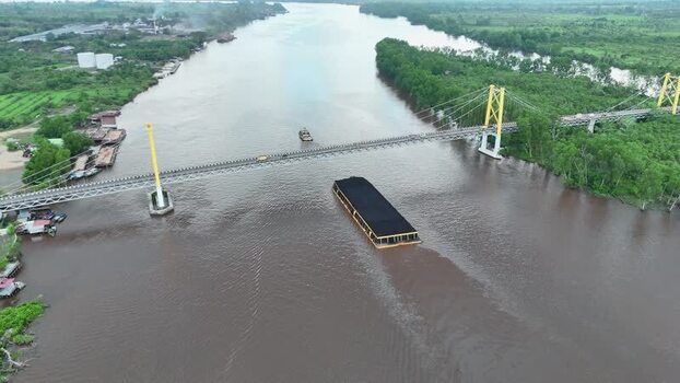 Aerial view of Barito River bridge in Indonesia.