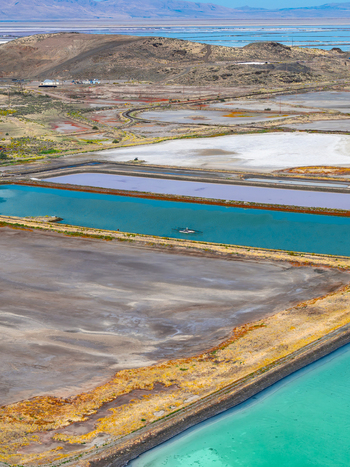 Aerial view of wastewater evaporation ponds by the Great Salt Lake featuring crystalized salt and crusted ground in Ogden Utah United States. Aerial view of wastewater evaporation ponds by the Great Salt Lake featuring crystalized salt and crusted ground in Ogden Utah United States.