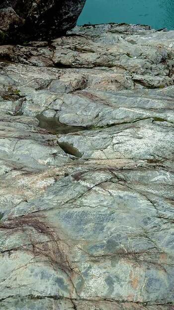 View of a turquoise river flowing through rocky banks New Zealand. View of a turquoise river flowing through rocky banks New Zealand.