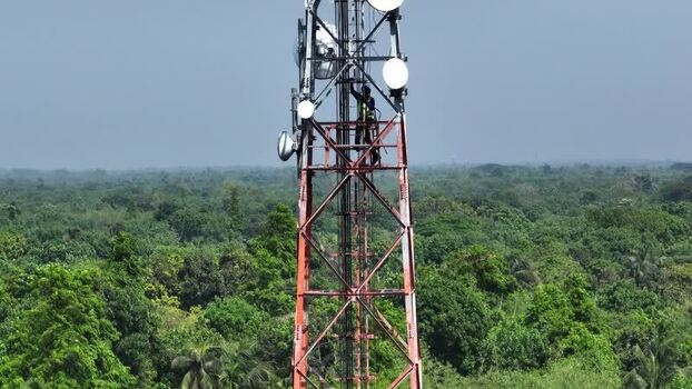 Aerial view of a technician on a telecom tower Bangladesh.