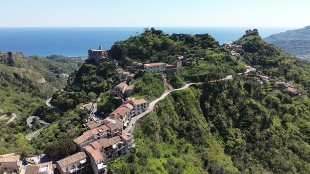 Aerial view of the hilltop village of Savoca in Sicily Italy. Aerial view of the hilltop village of Savoca in Sicily Italy.