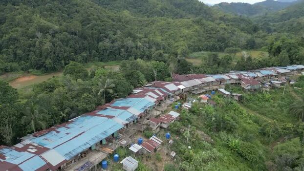 Aerial view of Batang Ai longhouse in Lubok Antu Malaysia. Aerial view of Batang Ai longhouse in Lubok Antu Malaysia.