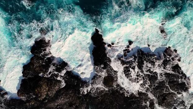Aerial view of waves crashing against Kalaemamo cliffs United States.
