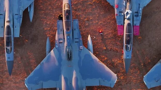 Aerial view of fighter jets on the ground United States. Aerial view of fighter jets on the ground United States.