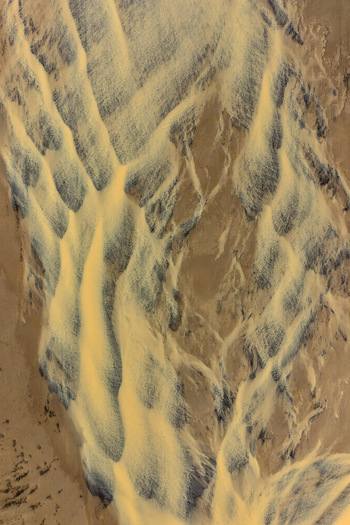 Aerial view of the intricate glacial patterns and sediment textures of Drangajokull glacier in Isafjordur Isafjardarbaer Iceland. Aerial view of the intricate glacial patterns and sediment textures of Drangajokull glacier in Isafjordur Isafjardarbaer Iceland.