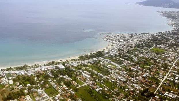 Aerial view of coastal city near sea Greece. Aerial view of coastal city near sea Greece.