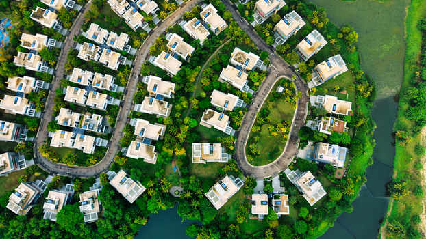 Aerial view of the Forest City residential development featuring modern houses nestled among lush greenery and winding roads in Gelang Patah Johor Darul Ta zim Malaysia.