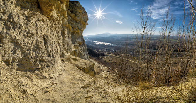 View of the limestone cliffs of Devin overlooking the Danube river valley under a bright sun and clear blue sky Bratislava IV Bratislava Region Slovakia. View of the limestone cliffs of Devin overlooking the Danube river valley under a bright sun and clear blue sky Bratislava IV Bratislava Region Slovakia.
